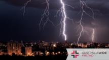 Lightning strikes over a city